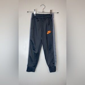 Nike Kids Dark Gray Joggers with Orange Logo‎